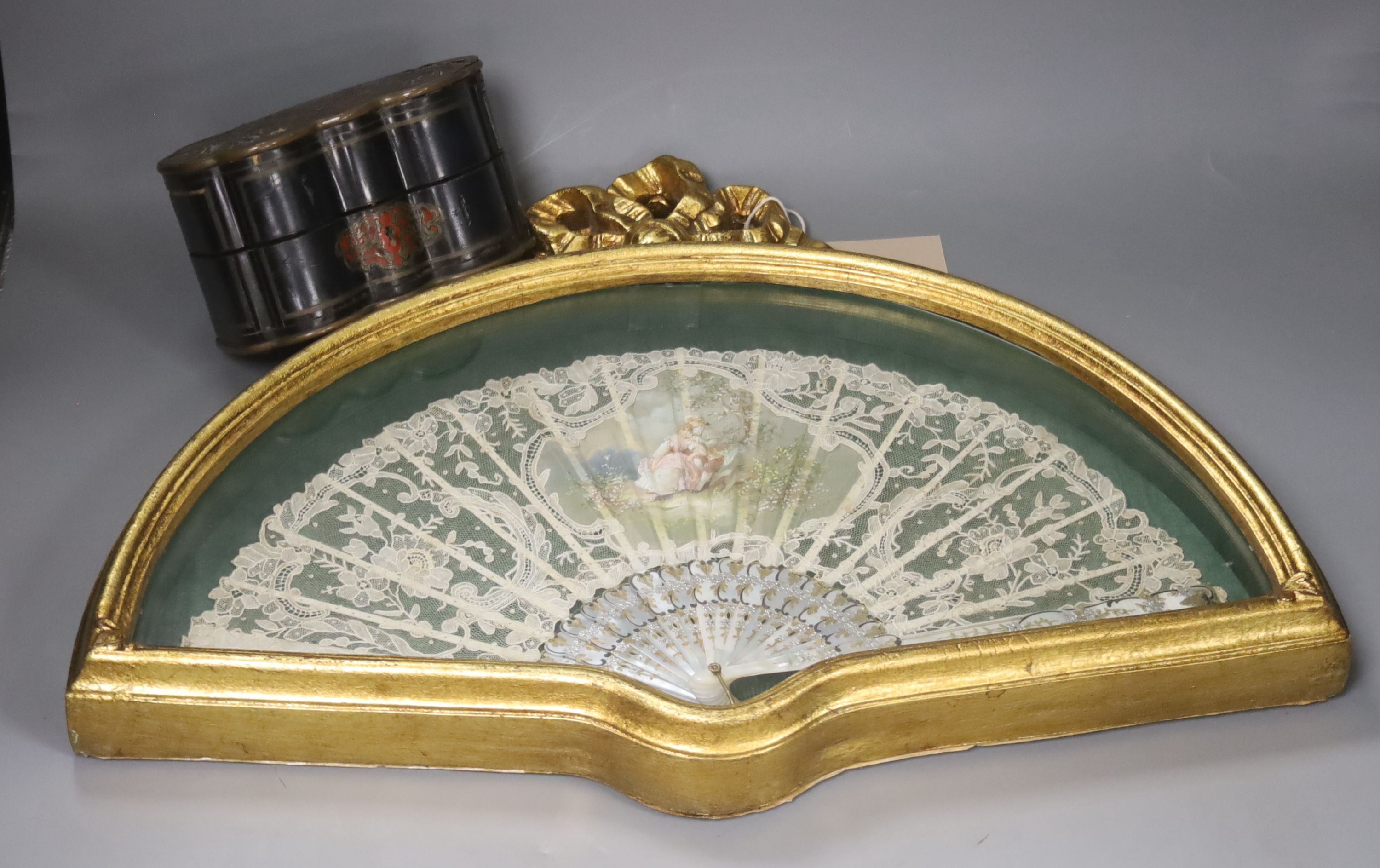 A 19th century mother of pearl and Brussels point de gaze lace fan, with painted panel (framed) and a pair of 19th century French glass scent bottles